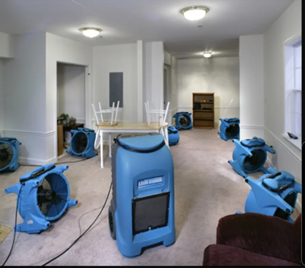 Air movers and dehumidifier setup for Water Extraction & Removal in Taos